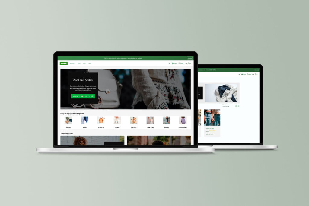 Mac laptop monitor with a clothing e-commerce website on screen. The website uses green colours.